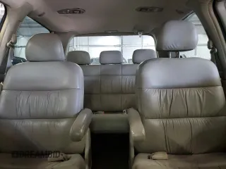 2000 Honda Odyssey EX with VIN 2HKRL1875YH611548, listed as a Copart auction lot 56593275 with 191,533 mi miles and Salvage title. Bid and sale history available at DreamBid. Image 10.