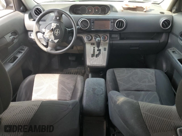 2014 Scion xB z VIN JTLZE4FE2EJ053923, wystawiony jako Copart lot #54121165 z przebiegiem Nie podano mil oraz Szkoda całkowita • Salvage title. Historia ofert i sprzedaży dostępna na DreamBid. Obrazek 8.