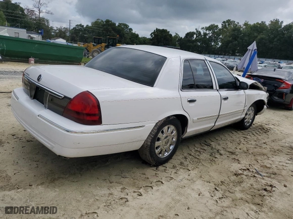 2006 Mercury Grand Marquis LS Premium with VIN 2MEHM75W26X619883, listed as a Copart auction lot 71742044 with 101,426 mi miles and Salvage Title. Bid and sale history available at carsss.com. Image 3.