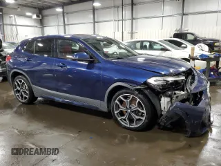 2020 BMW X2 xDrive28i with VIN WBXYJ1C03L5N94692, listed as a Copart auction lot 48140135 with 49,586 mi miles and Salvage Title. Bid and sale history available at carsss.com. Image 4.
