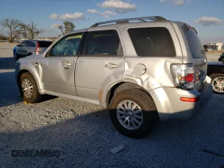 2009 Mercury Mariner Premier z VIN 4M2CU87789KJ23933, wystawiony jako Copart lot #45120455 z przebiegiem 104 465 mil mil oraz Szkody całkowita. Historia ofert i sprzedaży dostępna na DreamBid. Obrazek 2.