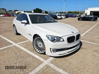 2013 BMW 7 Series 750i xDrive with VIN WBAYB6C51DDS16345, listed as a Copart auction lot 64604525 with 115,128 mi miles and Clean title. Bid and sale history available at DreamBid. Image 1.