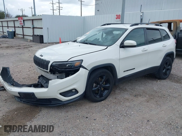 2019 Jeep Cherokee Latitude Plus with VIN 1C4PJLLBXKD405322, listed as a IAAI auction lot 41708104 with 93,295 mi miles and . Bid and sale history available at DreamBid. Image 2.