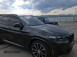 2023 BMW X3 M40i with VIN 5UX83DP0XP9P69052, listed as a Copart auction lot 54243525 with 22,940 mi miles and Salvage Title. Bid and sale history available at DreamBid. Image 11.