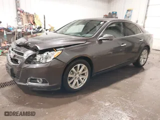 2013 Chevrolet Malibu LTZ with VIN 1G11H5SA0DF288078, listed as a IAAI auction lot 41441128 with 92,318 mi miles. Bid and sale history available at carsss.com. Image 2.