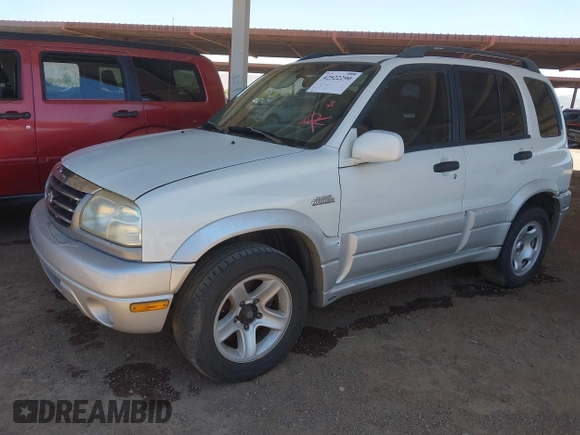 2003 Suzuki Grand Vitara z VIN JS3TD62V434101747, wystawiony jako IAAI lot #42522290 z przebiegiem 230 837 mil mil oraz . Historia ofert i sprzedaży dostępna na DreamBid. Obrazek 2.