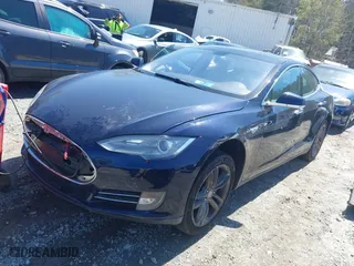 2013 Tesla Model S with VIN 5YJSA1CNXDFP20609, listed as a IAAI auction lot 41831300 with 156541 miles. Bid and sale history available at carsss.com. Image 20.