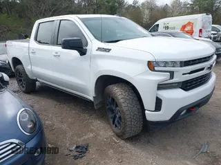 2021 Chevrolet Silverado 1500 RST with VIN 1GCUYEEDXMZ115466, listed as a IAAI auction lot 41751297 with 142,522 mi miles. Bid and sale history available at carsss.com. Image 1.
