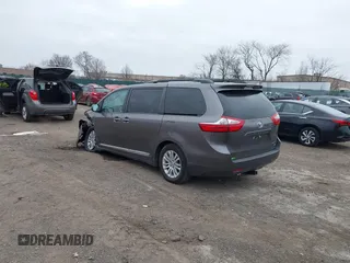 2016 Toyota Sienna XLE with VIN 5TDYK3DCXGS737846, listed as a IAAI auction lot 41782055 with 126,846 mi miles. Bid and sale history available at carsss.com. Image 3.