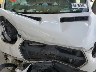 2021 Ford Transit Cargo with VIN 1FTBR1C85MKA88804, listed as a Copart auction lot 69792534 with Not Provided miles and Salvage Title. Bid and sale history available at DreamBid. Image 12.