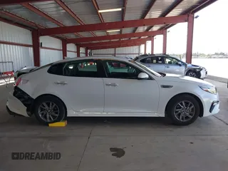 2020 Kia Optima SE z VIN 5XXGT4L36LG393377, wystawiony jako IAAI lot #41836704 z przebiegiem 86 234 mil mil oraz . Historia ofert i sprzedaży dostępna na DreamBid. Obrazek 13.