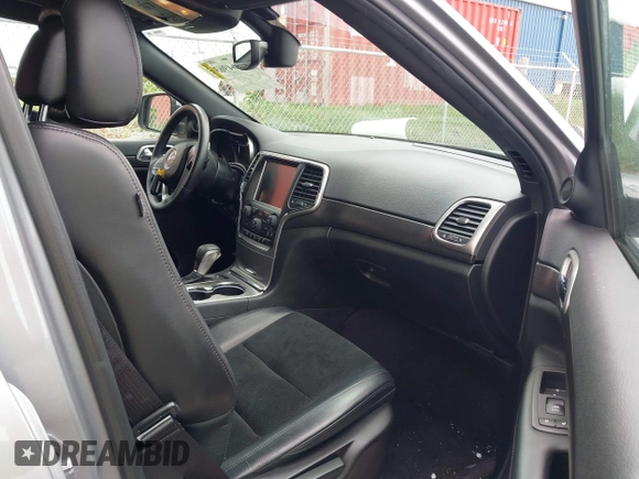 2017 Jeep Grand Cherokee Laredo with VIN 1C4RJFAG1HC701921, listed as a IAAI auction lot 42164963 with 135,039 mi miles and . Bid and sale history available at DreamBid. Image 5.