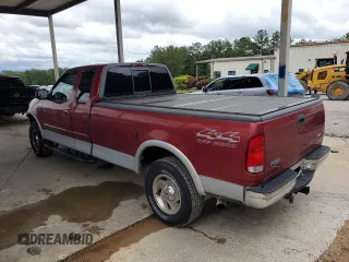 2000 Ford F-150 XL z VIN 1FTRX18LXYNB45648, wystawiony jako Copart lot #60152425 z przebiegiem 92 774 mil mil oraz Szkoda całkowita • Salvage title. Historia ofert i sprzedaży dostępna na DreamBid. Obrazek 2.