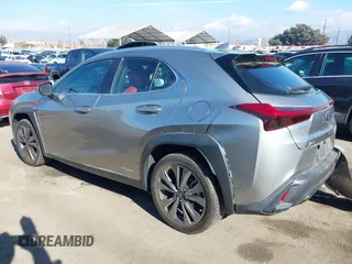 2021 Lexus UX 250h F Sport with VIN JTHE9JBH8M2051954, listed as a IAAI auction lot 40978984 with 60,276 mi miles and . Bid and sale history available at DreamBid. Image 3.