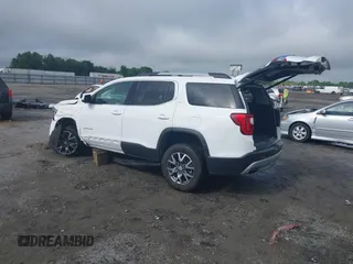2023 GMC Acadia SLT with VIN 1GKKNML4XPZ156685, listed as a IAAI auction lot 42231988 with 61,094 mi miles and . Bid and sale history available at DreamBid. Image 3.