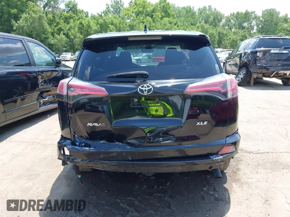 2018 Toyota RAV4 XLE with VIN 2T3WFREV3JW468450, listed as a IAAI auction lot 42528560 with 77,513 mi miles and . Bid and sale history available at DreamBid. Image 16.