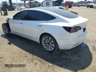 2019 Tesla Model 3 Mid Range with VIN 5YJ3E1EA0KF466585, listed as a Copart auction lot 50313695 with 70,703 mi miles and Salvage Title. Bid and sale history available at carsss.com. Image 2.