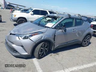 2019 Toyota C-HR XLE with VIN JTNKHMBX8K1046347, listed as a IAAI auction lot 42140743 with 49,918 mi miles and . Bid and sale history available at DreamBid. Image 16.