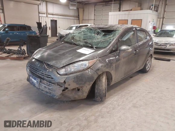 2015 Ford Fiesta SE with VIN 3FADP4BJ7FM218586, listed as a IAAI auction lot 41603479 with 97,460 mi miles. Bid and sale history available at carsss.com. Image 2.