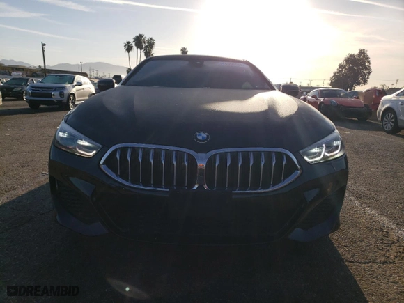 2020 BMW 8 Series 840i with VIN WBAGV4C06LCE28998, listed as a Copart auction lot 48566634 with 54,946 mi miles and Salvage Title. Bid and sale history available at carsss.com. Image 5.