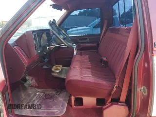 1989 GMC Sierra 1500 with VIN 1GTDC14H6KE537928, listed as a Copart auction lot 58233914 with 90,754 mi miles and Salvage Title. Bid and sale history available at DreamBid. Image 7.
