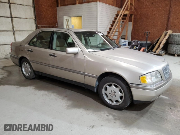 1995 Mercedes-Benz C with VIN WDBHA28E8SF115598, listed as a Copart auction lot 50145195 with 129,134 mi miles and Clean Title. Bid and sale history available at carsss.com. Image 4.
