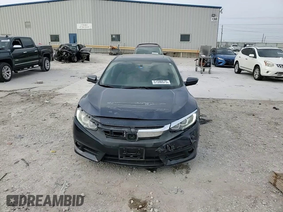 2016 Honda Civic EX-T z VIN 19XFC1F37GE012186, wystawiony jako Copart lot #51590575 z przebiegiem 121 041 mil mil oraz Szkoda całkowita • Salvage title. Historia ofert i sprzedaży dostępna na DreamBid. Obrazek 11.
