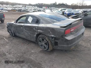 2014 Dodge Charger RT Plus with VIN 2C3CDXDTXEH244650, listed as a IAAI auction lot 41320486 with 126,493 mi miles. Bid and sale history available at carsss.com. Image 3.