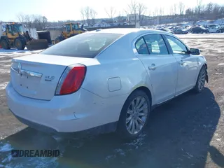 2010 Lincoln MKS w/EcoBoost with VIN 1LNHL9FT8AG609454, listed as a IAAI auction lot 41404502 with 42,154 mi miles. Bid and sale history available at carsss.com. Image 4.