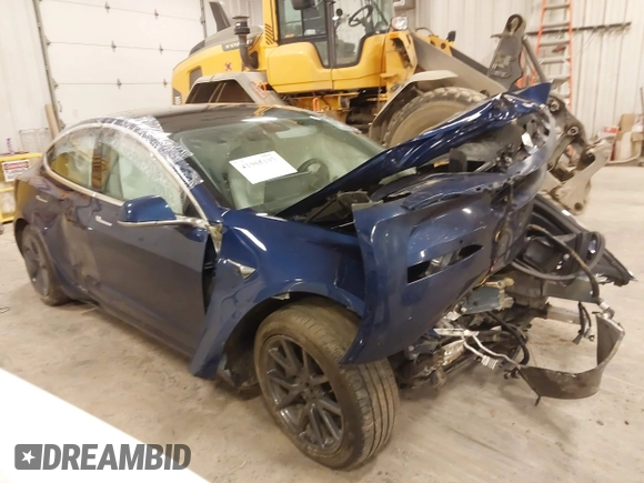 2018 Tesla Model 3 Long Range Battery with VIN 5YJ3E1EB7JF086201, listed as a IAAI auction lot 41965193 with 99,231 mi miles and . Bid and sale history available at DreamBid. Image 1.