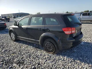 2015 Dodge Journey American Value with VIN 3C4PDCAB9FT692632, listed as a Copart auction lot 55261175 with 139,874 mi miles and Salvage Title. Bid and sale history available at DreamBid. Image 2.