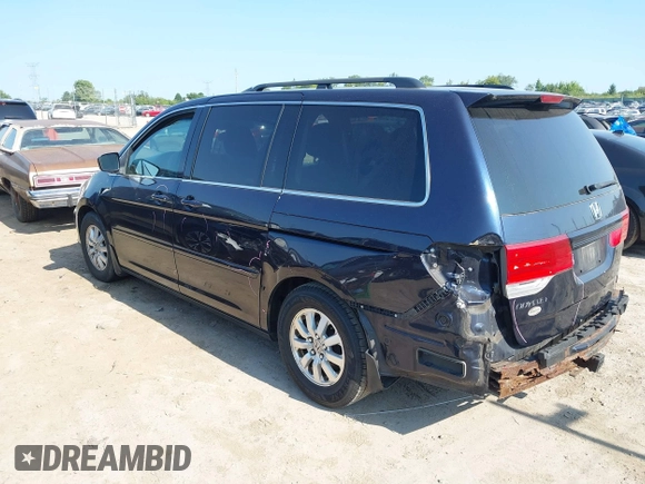 2008 Honda Odyssey EX with VIN 5FNRL38478B078862, listed as a IAAI auction lot 40090252 with 184,583 mi miles. Bid and sale history available at carsss.com. Image 3.