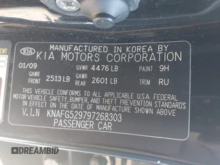 2009 Kia Rondo LX with VIN KNAFG529797268303, listed as a IAAI auction lot 42088100 with 140,458 mi miles. Bid and sale history available at carsss.com. Image 9.