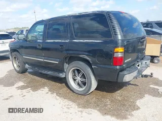 2004 Chevrolet Tahoe LT with VIN 1GNEC13Z74J323109, listed as a IAAI auction lot 41829422 with 261,636 mi miles. Bid and sale history available at carsss.com. Image 3.