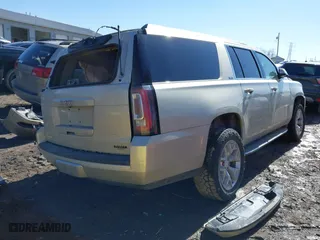 2016 GMC Yukon XL SLE with VIN 1GKS2FKC9GR458451, listed as a IAAI auction lot 41664562 with 196,400 mi miles. Bid and sale history available at carsss.com. Image 4.