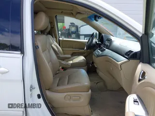2010 Honda Odyssey EX-L with VIN 5FNRL3H67AB003148, listed as a IAAI auction lot 42244575 with 176,119 mi miles and . Bid and sale history available at DreamBid. Image 5.