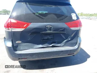 2014 Toyota Sienna L with VIN 5TDZK3DC2ES493997, listed as a IAAI auction lot 41996586 with 192,297 mi miles. Bid and sale history available at carsss.com. Image 6.