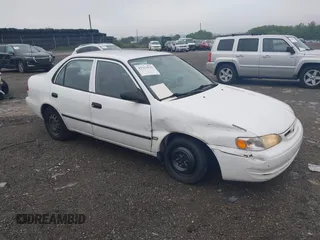2000 Toyota Corolla VE with VIN 2T1BR12E2YC333802, listed as a IAAI auction lot 42513833 with 92,245 mi miles and . Bid and sale history available at DreamBid. Image 1.