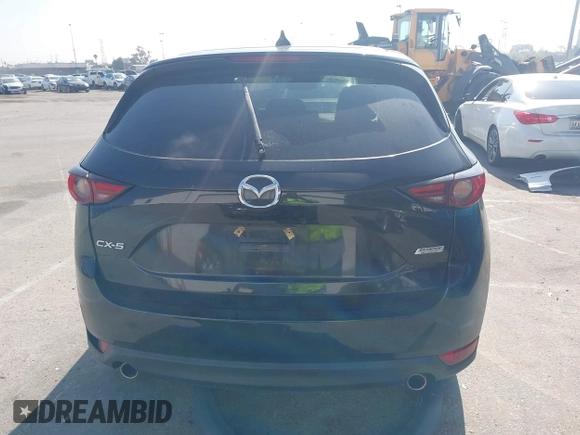 2019 Mazda CX-5 Grand Touring with VIN JM3KFADMXK1547727, listed as a IAAI auction lot 42138071 with Not provided miles and . Bid and sale history available at DreamBid. Image 16.