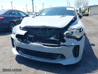 2018 Kia Stinger GT1 with VIN KNAE45LC7J6034168, listed as a IAAI auction lot 41979658 with 111,854 mi miles. Bid and sale history available at carsss.com. Image 6.