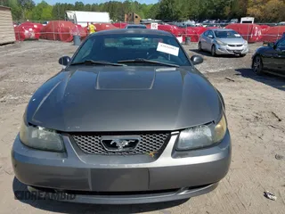 2004 Ford Mustang Standard z VIN 1FAFP40644F236905, wystawiony jako IAAI lot #42016081 z przebiegiem 167 733 mil mil oraz . Historia ofert i sprzedaży dostępna na DreamBid. Obrazek 12.