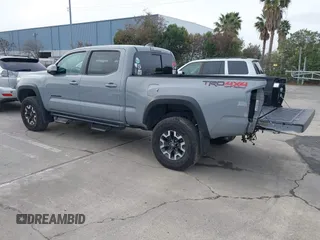 2021 Toyota Tacoma 4WD SR5 with VIN 3TMDZ5BN8MM114229, listed as a IAAI auction lot 41583843 with 46,927 mi miles. Bid and sale history available at carsss.com. Image 3.