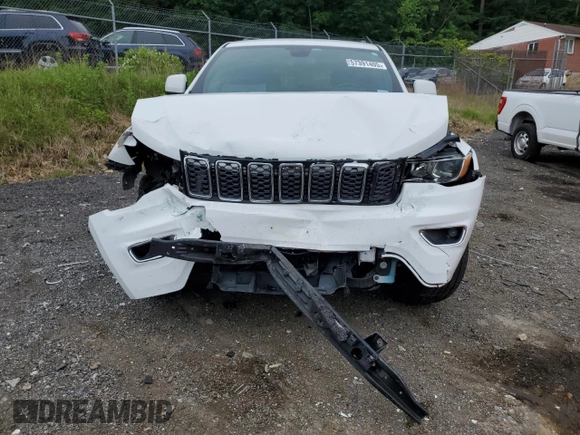 2018 Jeep Grand Cherokee Laredo E with VIN 1C4RJEAGXJC430096, listed as a Copart auction lot 57391405 with 89,248 mi miles and Salvage title. Bid and sale history available at DreamBid. Image 5.