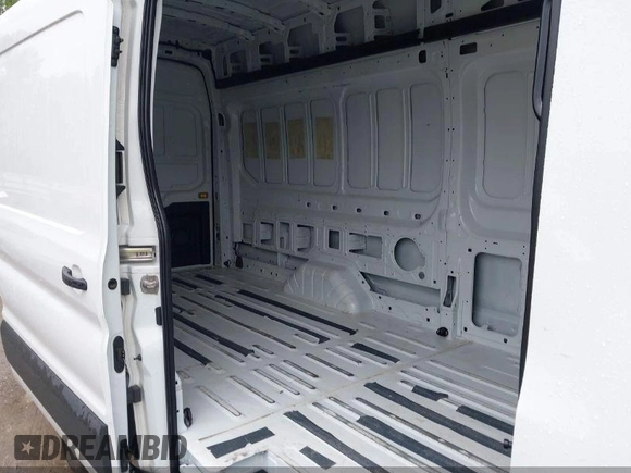 2023 Ford Transit Cargo с VIN 1FTBR3U84PKB02433, выставлен на аукционе IAAI как лот 41895220 с пробегом 87 542 миль миль и . История ставок и продаж доступна на DreamBid. Изображение 8.