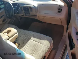 1998 Ford F-150 with VIN 1FTZX1763WNC22708, listed as a Copart auction lot 56914515 with 179,011 mi miles and Salvage title. Bid and sale history available at DreamBid. Image 8.