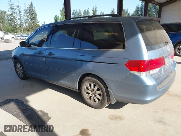 2010 Honda Odyssey EX-L with VIN 5FNRL3H61AB046416, listed as a IAAI auction lot 42157812 with 129,525 mi miles and . Bid and sale history available at DreamBid. Image 3.