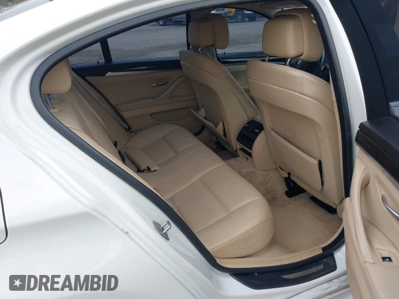 2013 BMW 5 Series 528i xDrive with VIN WBAXH5C5XDD106981, listed as a IAAI auction lot 42012477 with 140,259 mi miles. Bid and sale history available at carsss.com. Image 8.