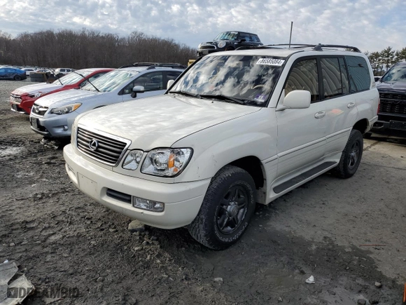 2001 Lexus LX 470 with VIN JTJHT00W013503264, listed as a Copart auction lot 86585084 with 308,384 mi miles and Salvage Title. Bid and sale history available at carsss.com. Image 1.