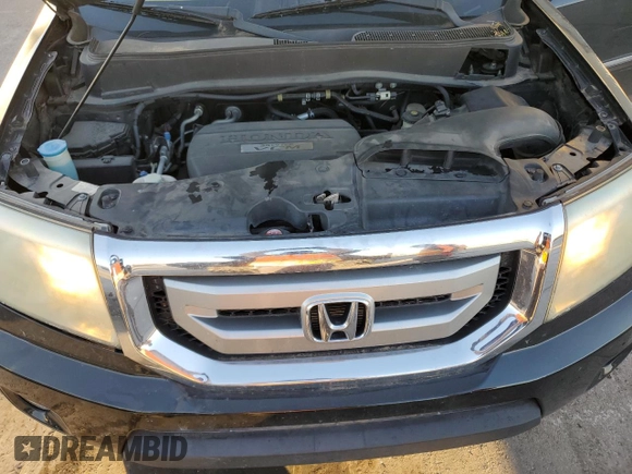 2010 Honda Pilot Touring with VIN 5FNYF3H83AB020730, listed as a Copart auction lot 84697994 with 238,329 mi miles and Salvage Title. Bid and sale history available at DreamBid. Image 12.