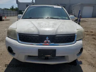 2011 Mitsubishi Endeavor SE z VIN 4A4JN3ASXBE022822, wystawiony jako Copart lot #57174715 z przebiegiem 149 769 mil mil oraz Czysty tytuł • Clean title. Historia ofert i sprzedaży dostępna na DreamBid. Obrazek 5.